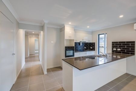 Brand-New Family Home in Park Lane Reserve! - Photo 2