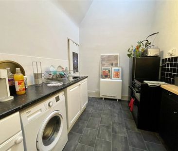 A first floor one bedroom apartment in this extremely convenient lo... - Photo 1