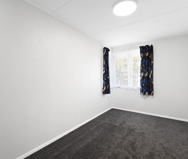 This charming 2-bedroom home with an additional sleepout is ideally... - Photo 4