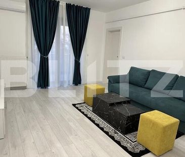 Prima închiriere: Apartament ultrafinisat cu 2 camere, parcare privată, zonă centrală - Fotografie 4