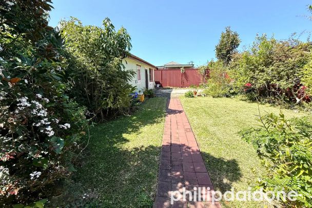 “Spacious 4-Bedroom Brick House” - Photo 1