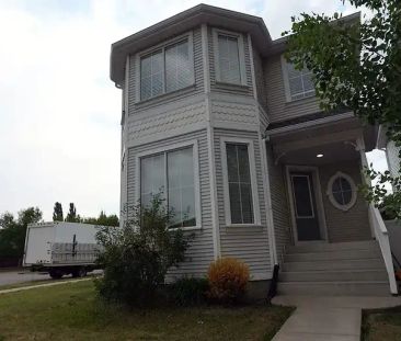 Beautiful 3-bedroom suburban home with mountain views | 168 Tuscany Springs Way Northwest, Calgary - Photo 1