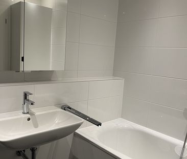 Moderne Neubauwohnung mit Loggia, Terrasse und Garten – inkl. TG-St... - Photo 6