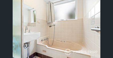 Oversized Three Bedroom Residence In A Tree Lined Street - Photo 4