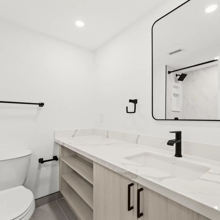 Charles West — 2 Bedroom + Den - Photo 1