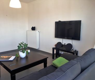 2 slaapkamerappartement met terras en 2 autostaanplaatsen - Photo 4