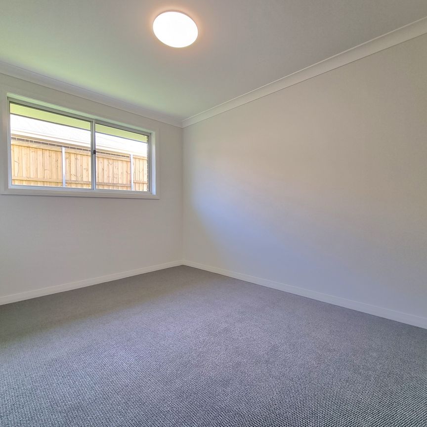 BRAND NEW Family Home with Flexible Floor Plan - Photo 1