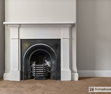 Freshly Updated & Centrally Located – Comfort Meets Convenience - Photo 1