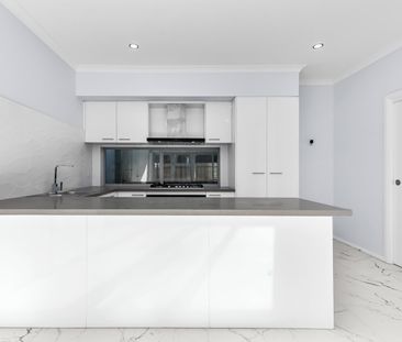 BRAND NEW HOME OFFERING EFFORTLESS LIFESTYLE - Photo 2
