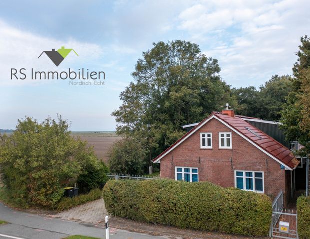 Traumhafte Obergeschosswohnung – modern, lichtdurchflutet und nur wenige Minuten vom Meer entfernt - Foto 1