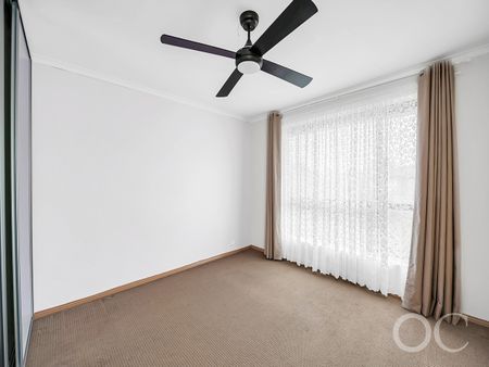 Open the Door to Comfortable Family Living in a Spacious Burton Home - Photo 4