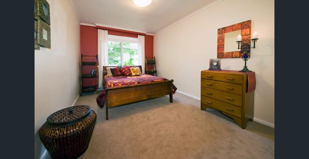NATURAL LIGHT FLOODS THIS SPACIOUS THREE BEDROOM HOME WITH BALCONY AND PARKING. PERFECT SPACE FOR WORKING FROM HOME - Photo 1