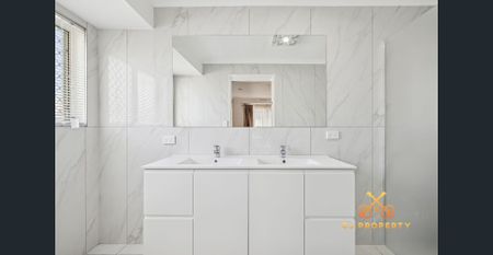 Spacious Brick & Tile Family Home with Huge Powered Shed & Remote Gate! - Photo 2