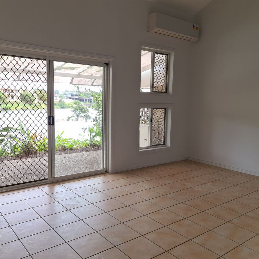 THREE BEDROOM TOWNHOUSE ON PEACEFUL POSITION OVERLOOKING WEST LAKE IN ROBINA - Photo 1