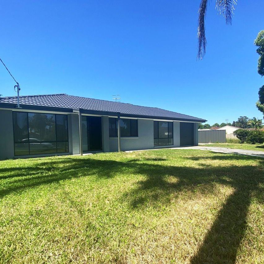 Spacious Family Home in the Heart of Bateau Bay - Photo 1