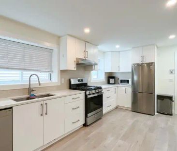 Ground Level 320 E 57TH AVENUE — 3 Bedroom - Photo 1