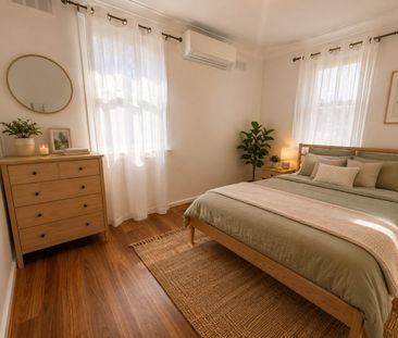 Freshly Renovated Three-Bedroom Home - Photo 2