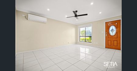 Perfect Family Home with Ducted Air Conditioning - Photo 5