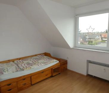 Hübsche 2-Zimmer-Dachgeschoss-Wohnung im Herzen von Asberg - Photo 1