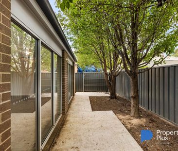 "Modern, Low-Maintenance Living in a Convenient Location" - Photo 6