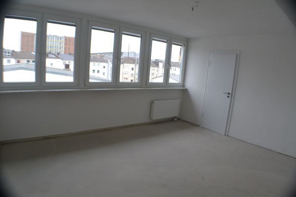 Stadt-Dachgeschosswohnung! - Foto 1