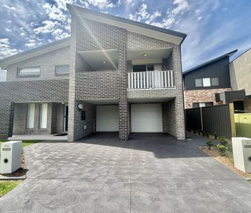 Stylish Three - Bedroom Home in Premier Gregory Hills Location - Photo 5