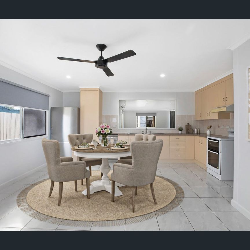 Charming family home with two sheds in Bucasia - Photo 1