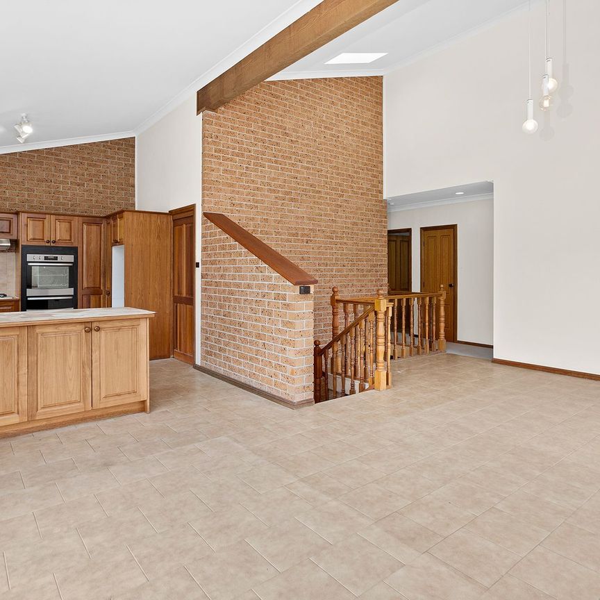 Spacious Family Living with Flexible Floor Plan in Prime Coniston Location - Photo 1