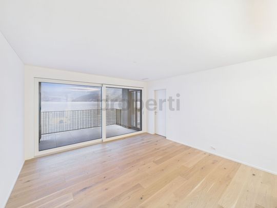 Fantastic 4.5-room new-build apartment with direct lake view in Beckenried - Photo 1