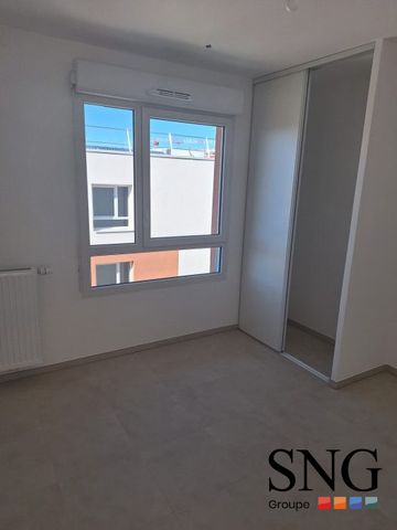 T4 NEUF AVEC LOGGIA + PARKINGS - Photo 2