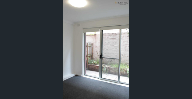 Walk to the Waves: Stylish 1-Bedroom Unit in a Fabulous Beachside Block! - Photo 1