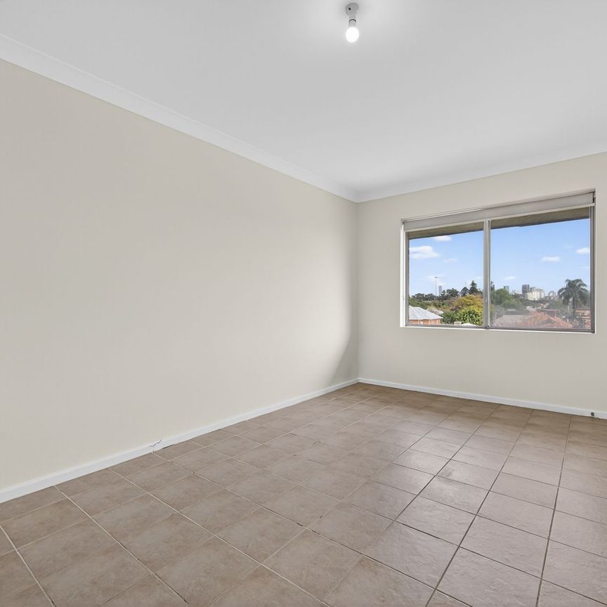 Freshly Updated Apartment in a Fantastic Location! - Photo 1