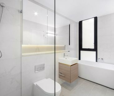 Tri-Level Townhouse I Near New Condition I Double Parking Space - Photo 3