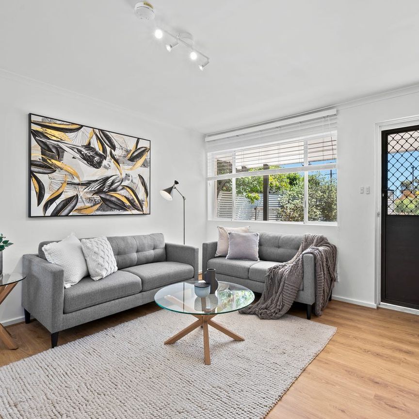 Easy Coastal Living – Refreshed & Ready to Enjoy - Photo 1