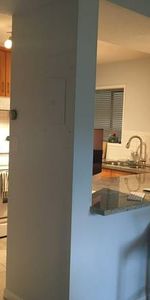 Unfurnished 2lvl 2bdrm 1.5bath stacked townhome Ambleside - Photo 3