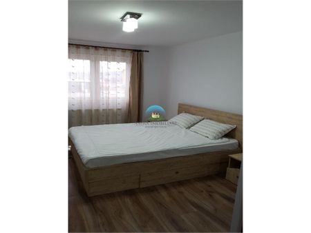 Apartament de inchiriat cu garaj subteran 2 camere - Fotografie 4