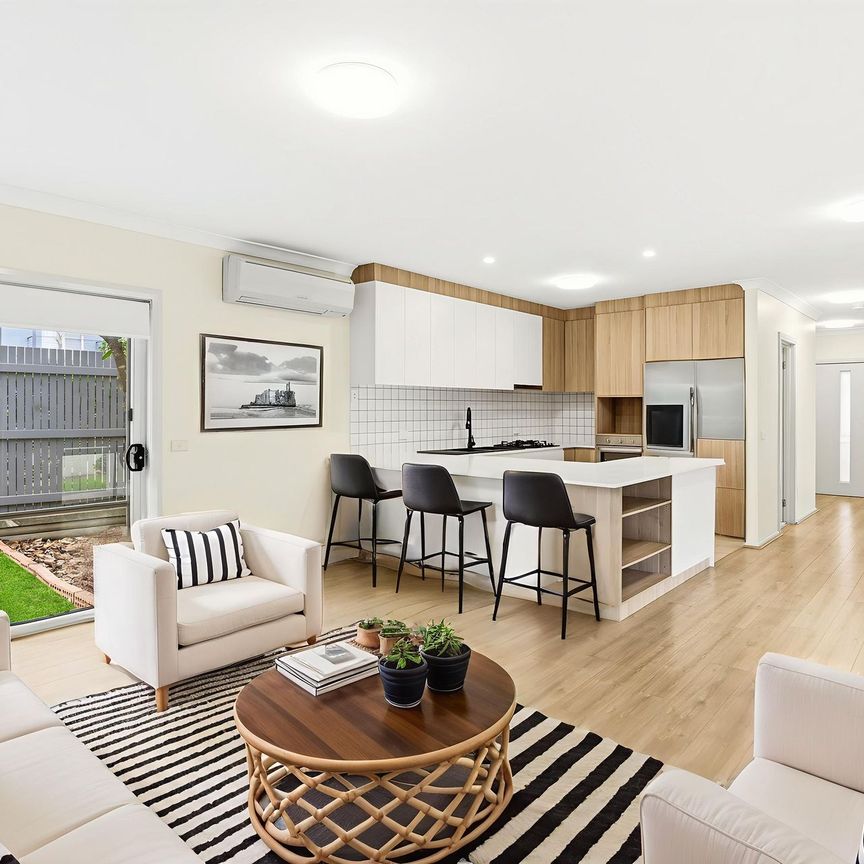 Modern Family Living with Stylish Alfresco and Private Balconies - Photo 1