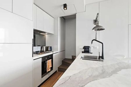 “IMPRESSIVE INDUSTRIAL APARTMENT DIRECTLY OPPOSITE ALBERT PARK LAKE! + Furnished” - Photo 2