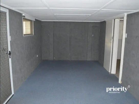 “Neat 4-Bedroom Home - Peaceful Living with Room to Move!” - Photo 1