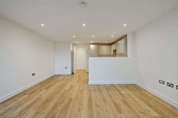 A brand new one bed apartment with one parking space offering light, modern interiors in a sought after location. - Photo 1