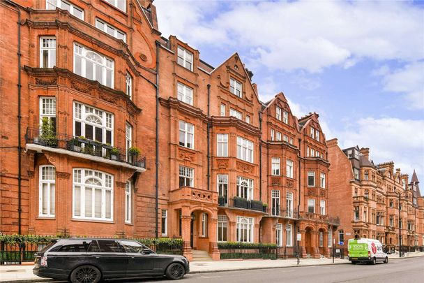 This 3 bedroom duplex flat is finished to an impeccable standard, boasting over 2559 square feet of breath-taking space in the heart of Knightsbridge. - Photo 1