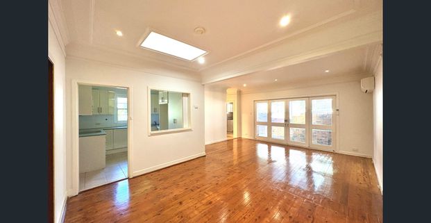 Ultimate Convenience 4 Bedroom House in prime location - Photo 1