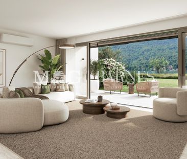 Villa di testa fronte lago con giardino privato a Caslano - Foto 1