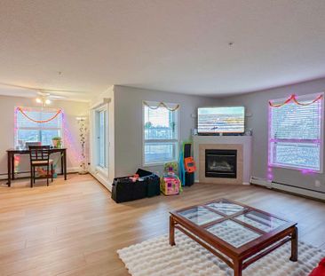 Spacious 2 Bed, 2.5 Bath Condo In Shawnessy | Fireplace, Balcony & ... - Photo 3