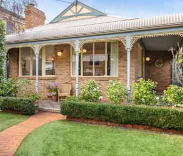 CHARMING VICTORIAN-INSPIRED HOME IN A BRIGHT, LOW MAINTENANCE GARDE... - Photo 3