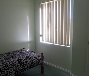 JUST A SHORT WALK TO THE BEACH OR SHOPS - Photo 1