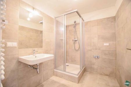 Erstbezug nach Sanierung: Charmante 2-Zimmer-Dachgeschoßwohnung mit Top-Lage - Photo 2