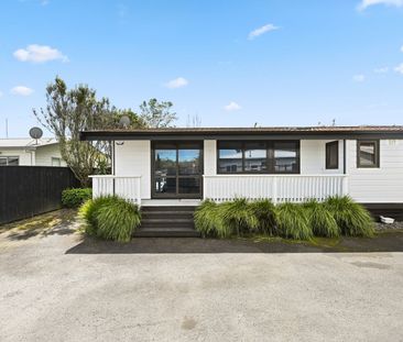 Immaculately presented, this three-bedroom, single-bathroom home of... - Photo 5