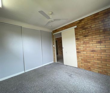 NEAT AND TIDY UNIT AT THE BEACH - Photo 3