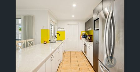 Spacious Family Home with Multiple Living Areas - Photo 2